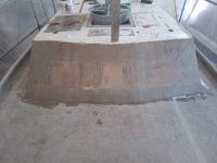 Earlier portholes are covered by fiberglass to strengthen cabin